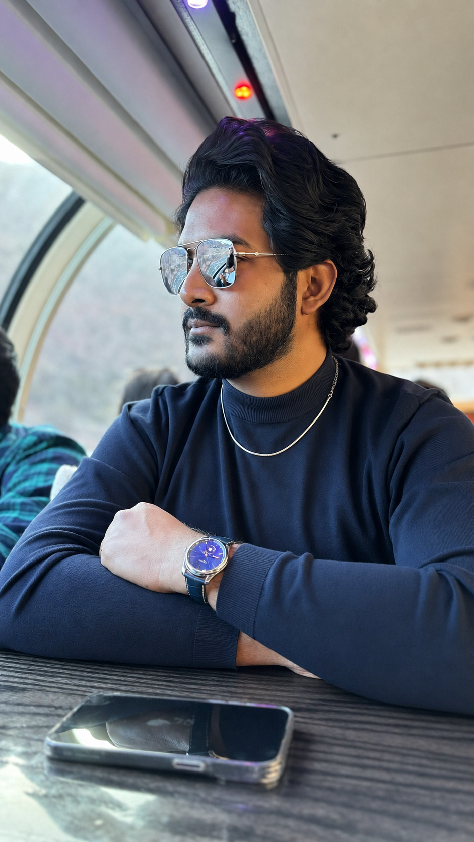 Teja Padala, creator of Profoundly, seated by a train window